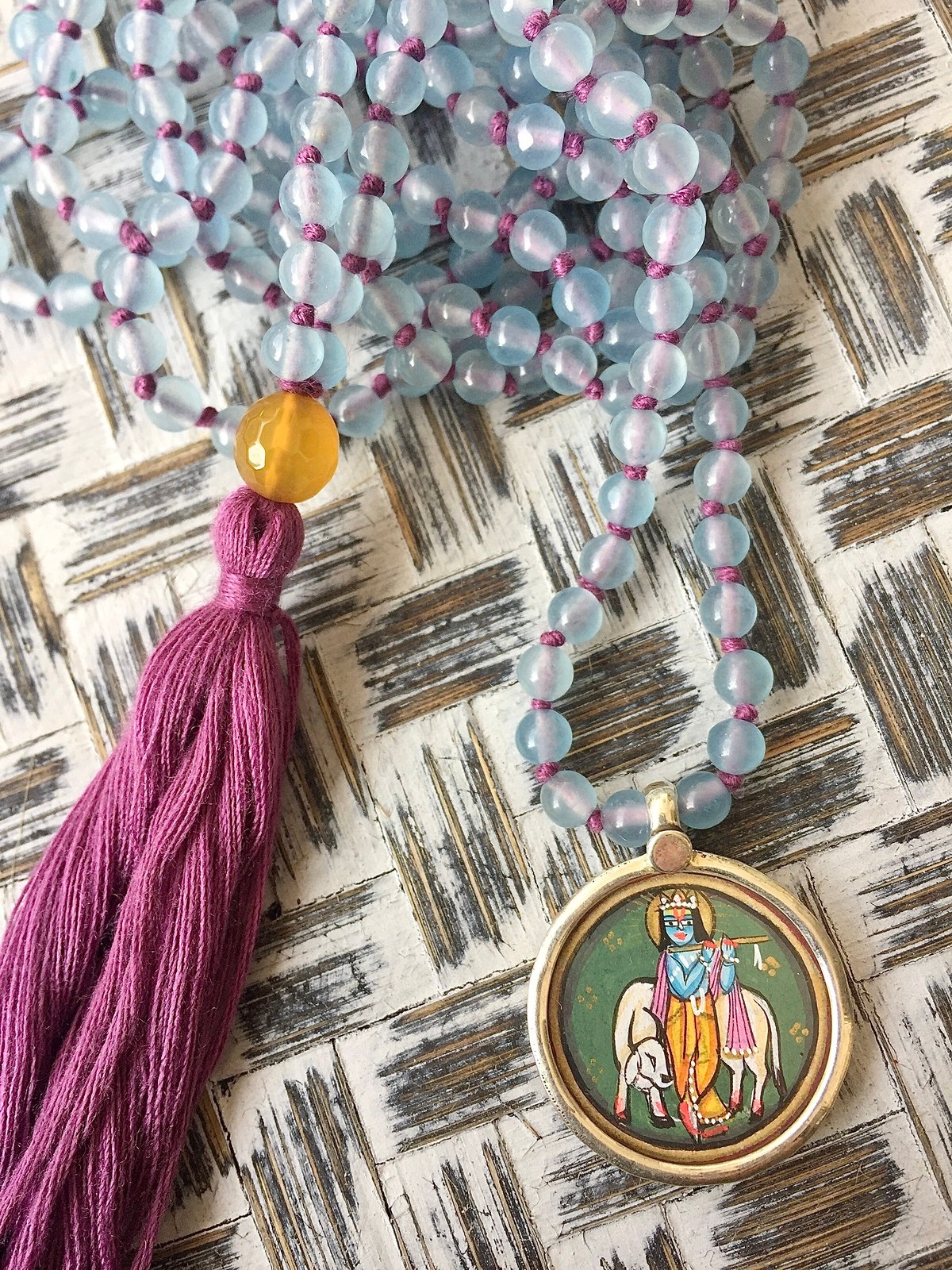 hand-painted medium krishna miniature silver pendant with light blue agate double mala