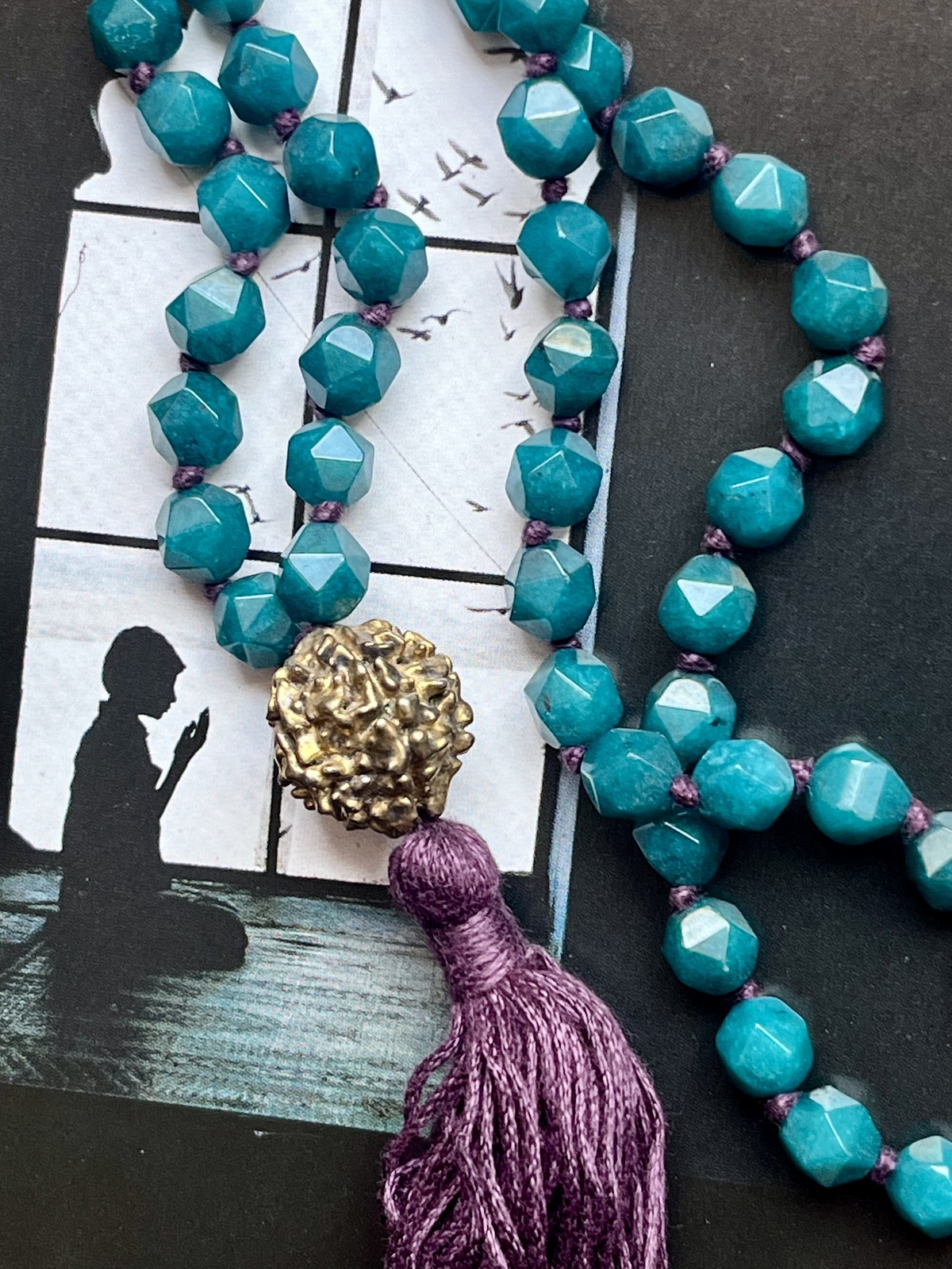 golden rudra necklace with 108 teal agate beads, mauve tassel, and gold-dipped rudraksha beads, spiritual handmade jewelry from india