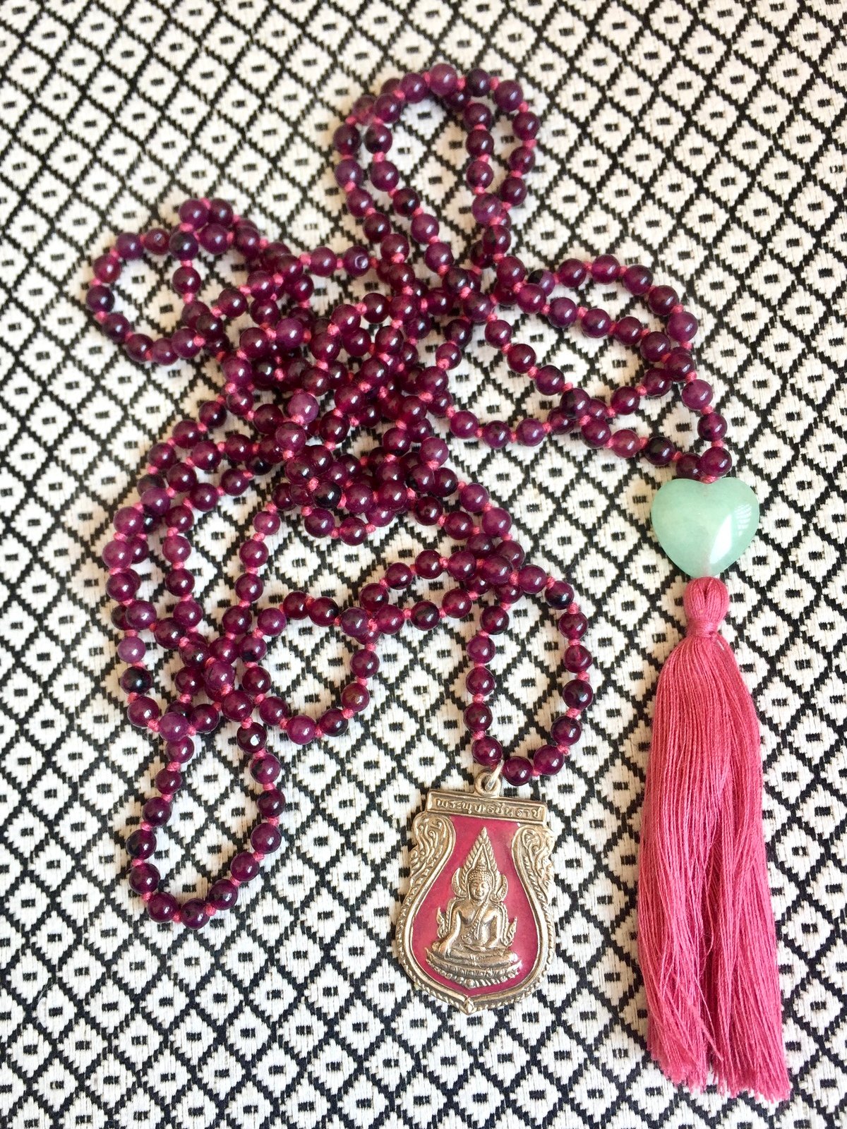 radiant buddha double mala with purple agate beads, thai buddha amulet, flame finial, and tassel with heart-shaped stone guru bead