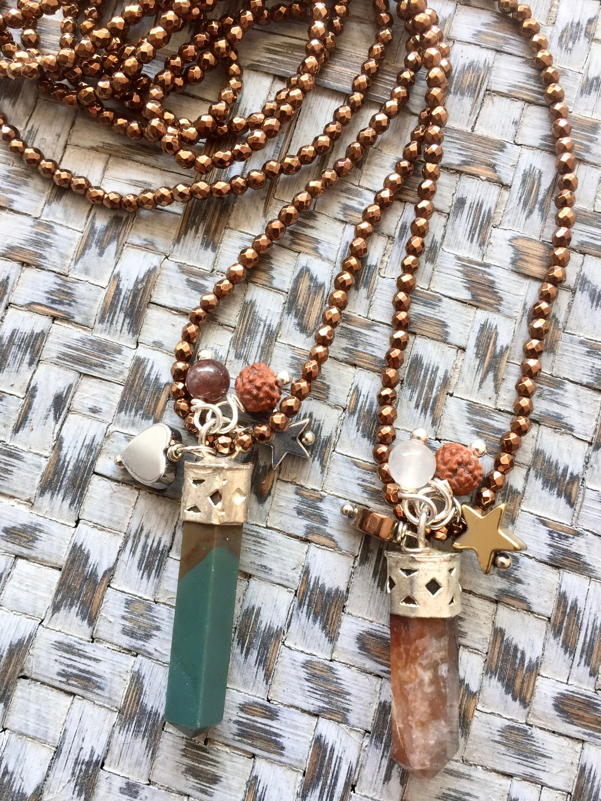 stardust crystal necklace made with 2mm faceted bronze hematite beads, featuring an earthy jasper or amethyst crystal, tiny rudraksha, white agate, and small hematite heart and star charms