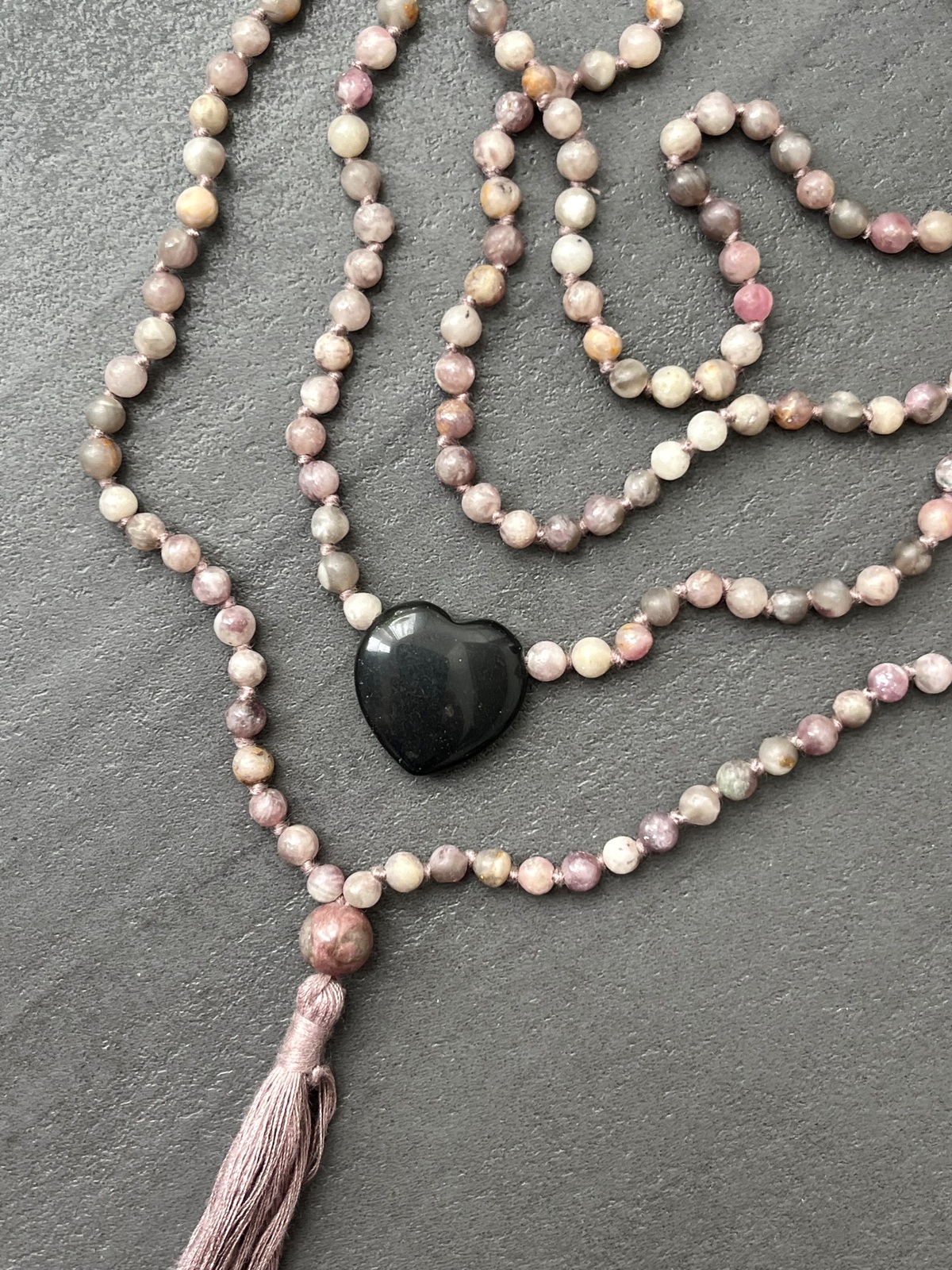 onyx heart double mala to wear with double loop, crafted with hand-knotted quartzite stone beads and a black onyx pendant, symbolizing love, peace, and protection